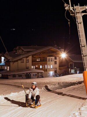 nachtrodeln_roggenboden_wildsschoenau_apparthotel_talhof_1.jpg