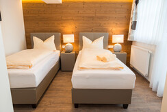Brunner Apartments Niederau, Schlafzimmer mit getr