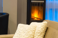 Brunner Apartments, Kamin in der Penthouse Suite