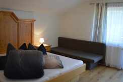 Schlafzimmer mit Sofa