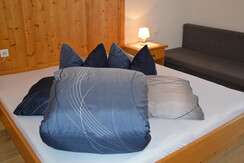 Schlafzimmer mit Sofa