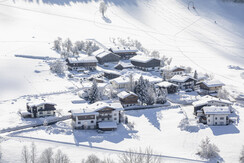 Blick auf Niederau Winter tief verschneit Wildschö
