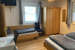 Dreibettzimmer